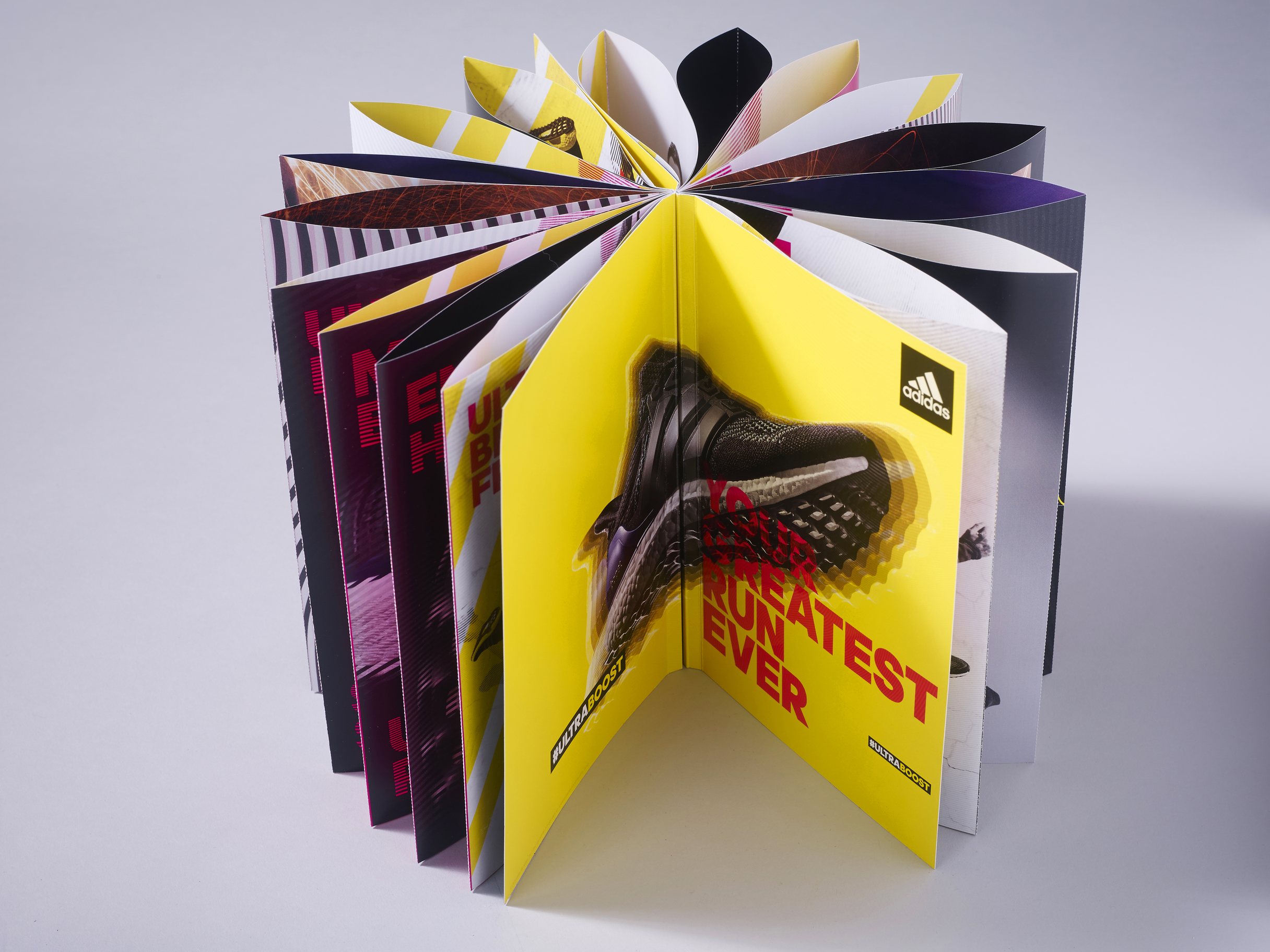 adidas Ultraboost Bible: fanned open, cover forward