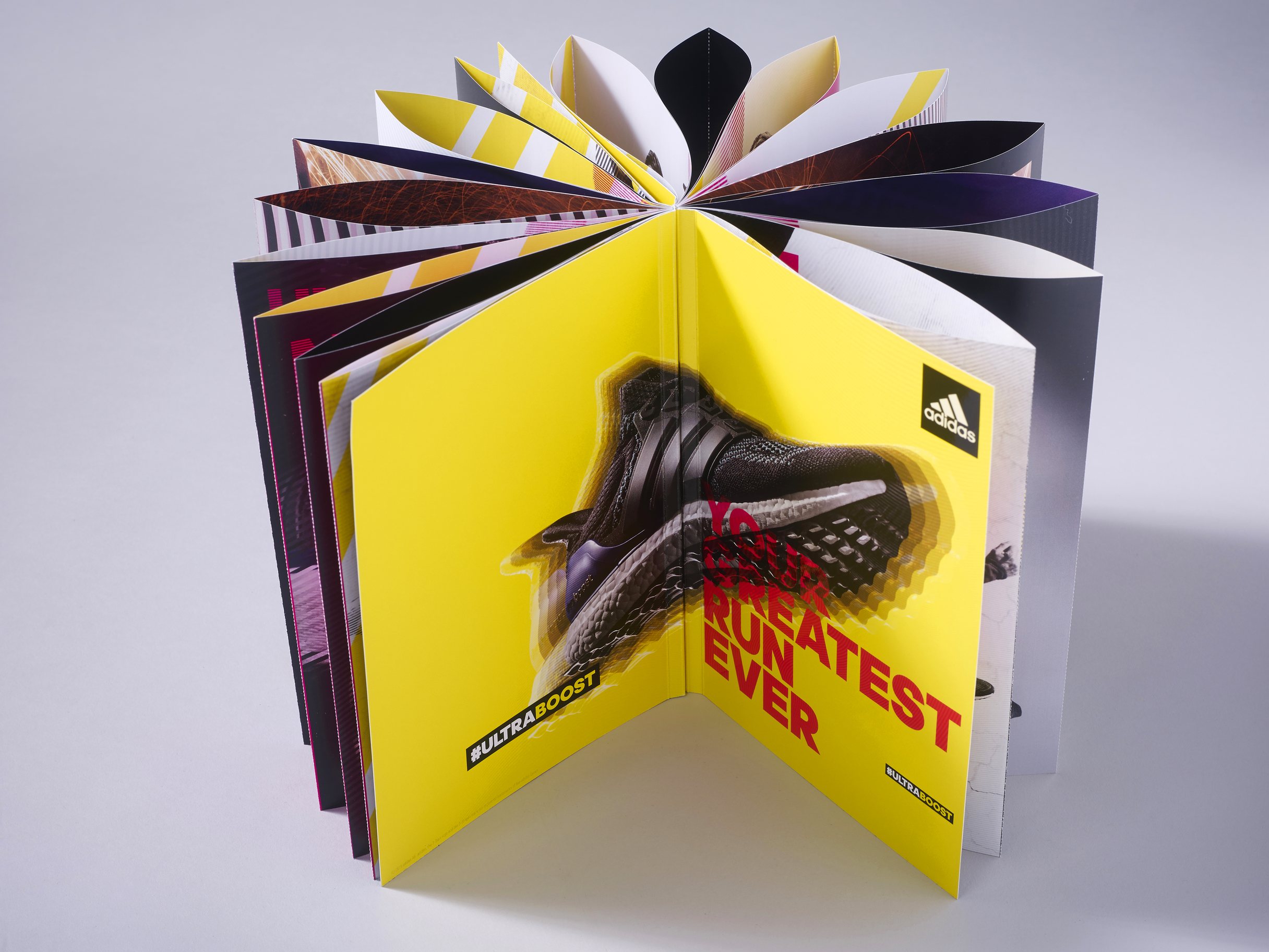 adidas Ultraboost Bible: standing with its pages fanned open