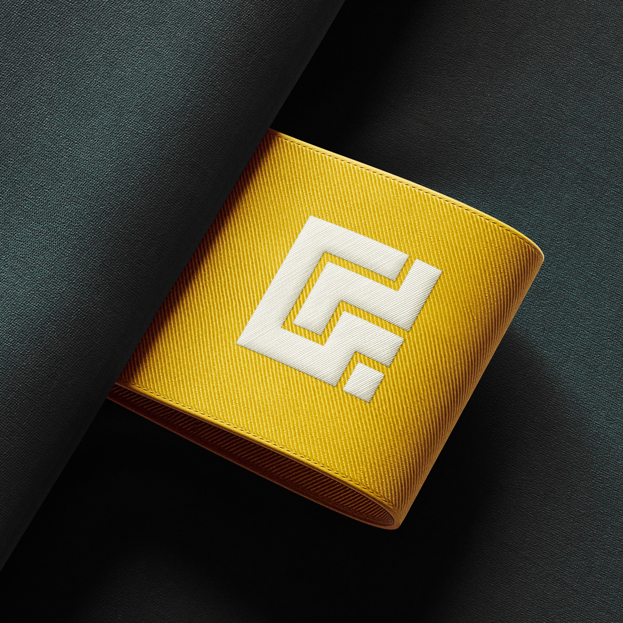 The Gladman G embossed on a gold band