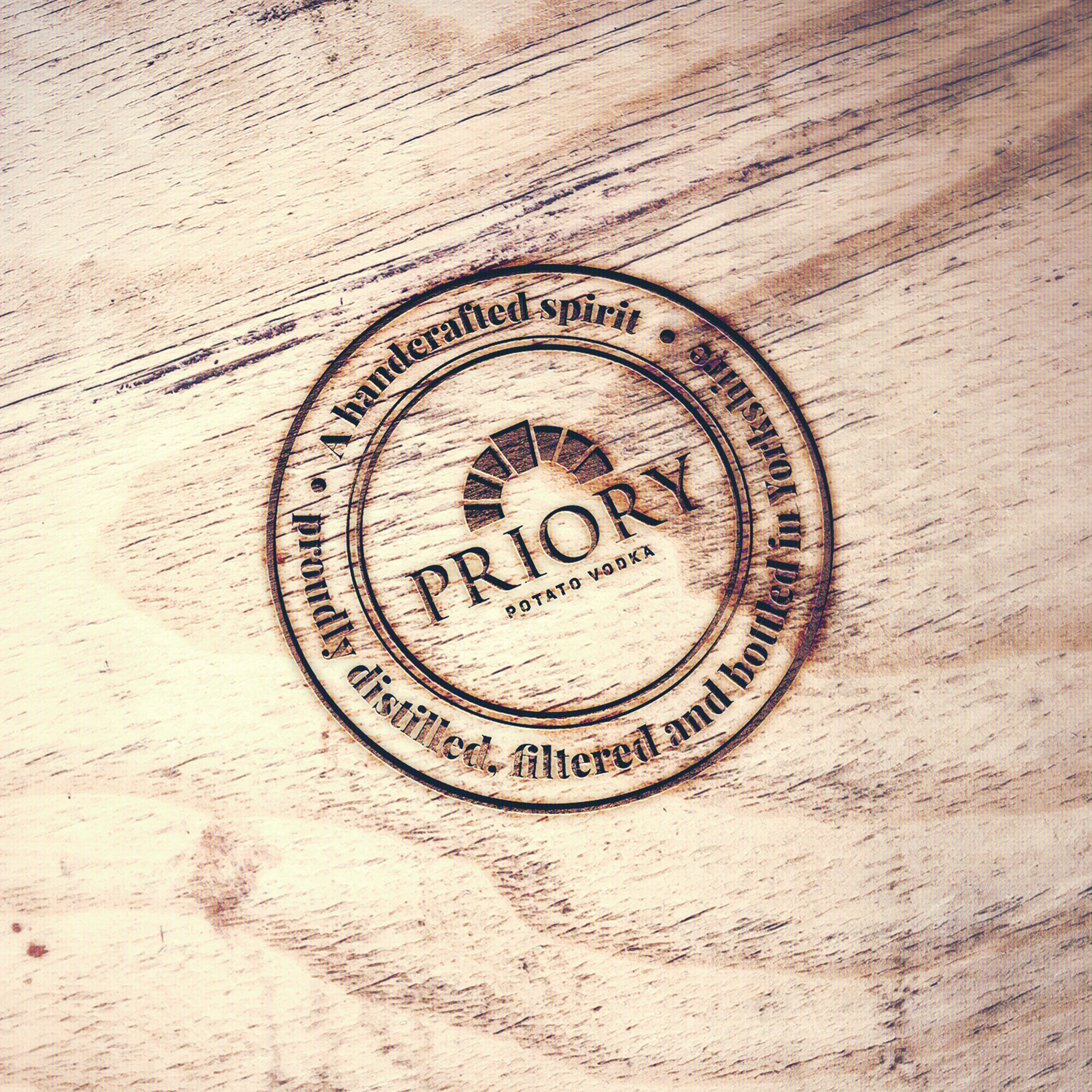 Priory quality stamp branded into wood