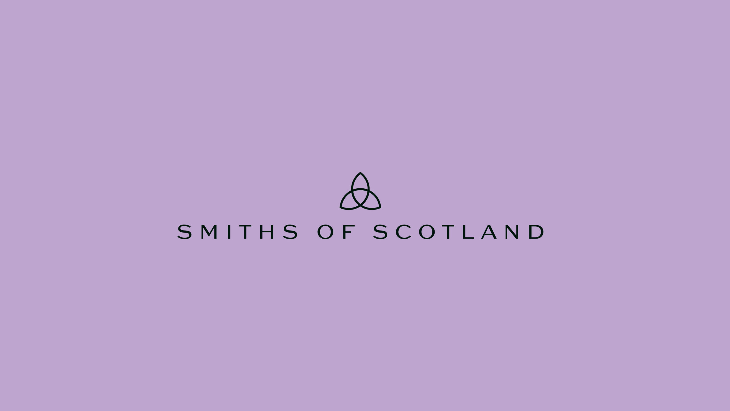 Smiths of Scotland lockup with the Celtic knot, dark on lilac
